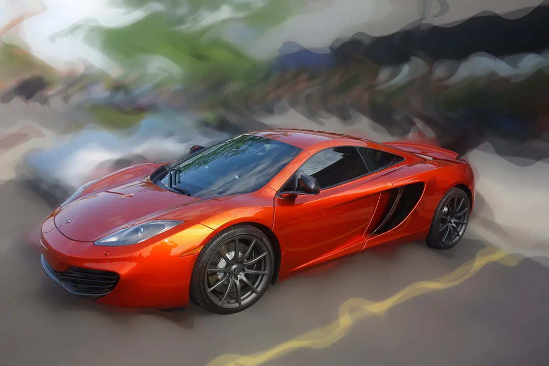 Digital painting of an orange McLaren MP4-12C from a high angle, sharp against a background smeared into green and grey horizontal bands.