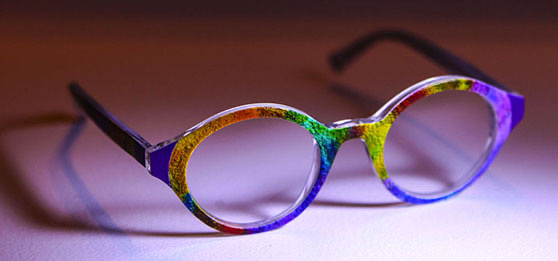 Product concept image of eyeglass frames with sliced strip patterning.
