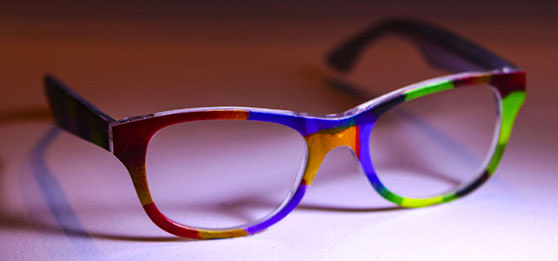 Product concept image of eyeglass frames with angular banded artwork.